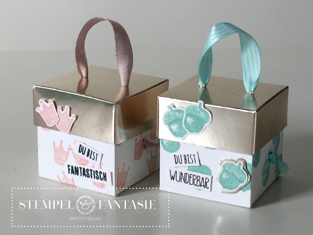 Kleine Boxen mit champagnerfarbenem Deckel