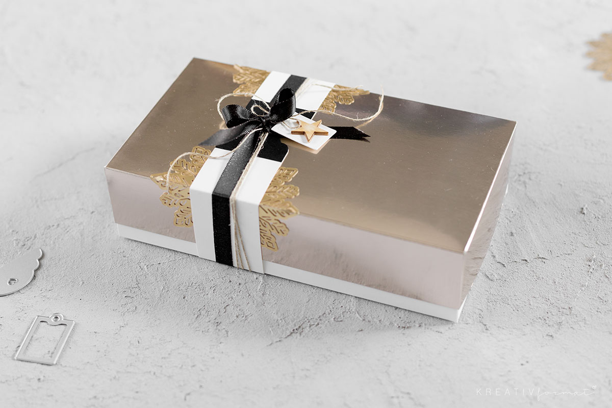 Weihnachtsverpackung in Champagner & Gold